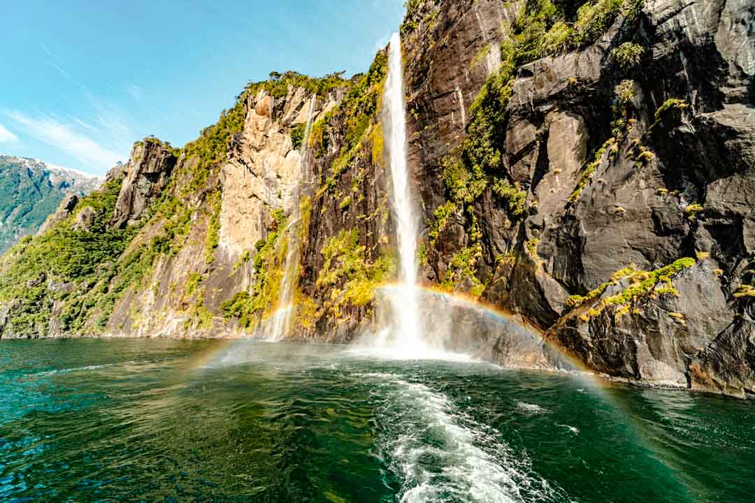 neuseeland suedinsel milford sound wasserfall regenbogen