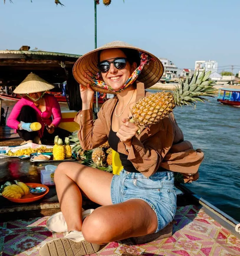Ananas-Tasting auf dem Floating Market auf dem Mekong