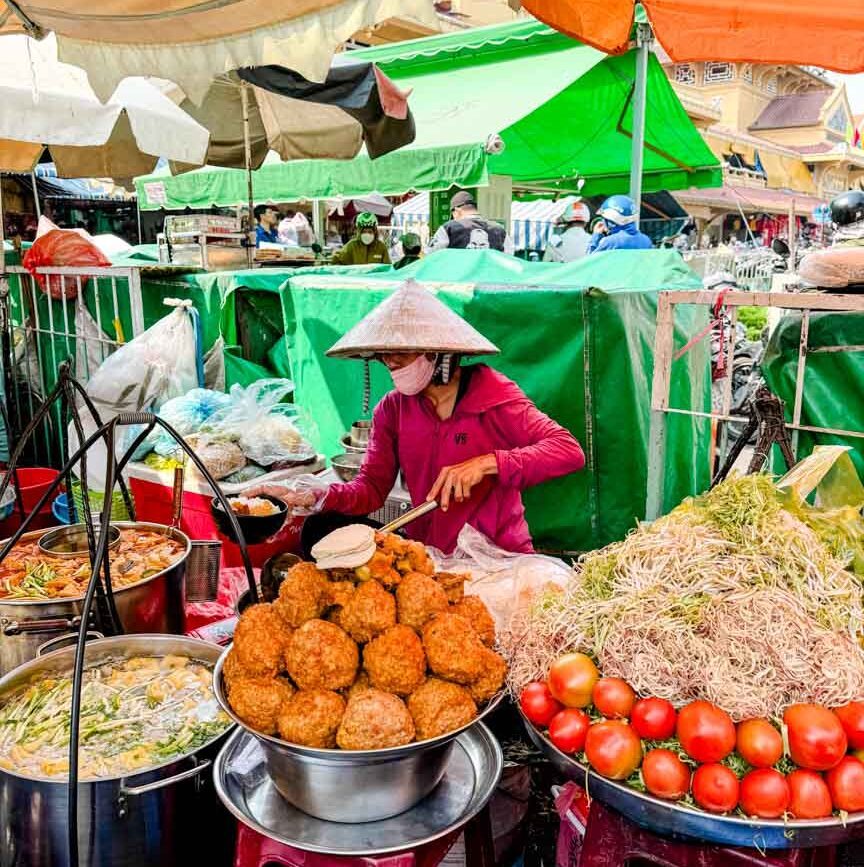 strassenverkaeufer auf dem ho chi minh stadt markt